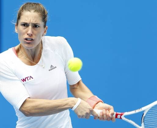 (141002) -- BEIJING, Oct. 2, 2014 -- Germany s Andrea Petkovic returns a hit during the women s third round match at the 2014 China Open in Beijing, capital of China, on Oct. 2, 2014. ChenxJianli 