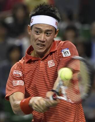(141002) -- TOKYO, Oct. 2, 2014 -- Kei Nishikori of Japan hits a return during the second round match at the Rakuten Japan Open Tennis Championships 2014 in Tokyo, Japan, Oct. 2, 2014. 