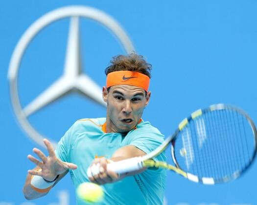 (141002) -- BEIJING, Oct. 2, 2014 -- Rafael Nadal of Spain returns a shot during the men s singles 2nd round match at the China Open tennis tournament in Beijing, China, Oct. 2, 2014. ChenxJianli 