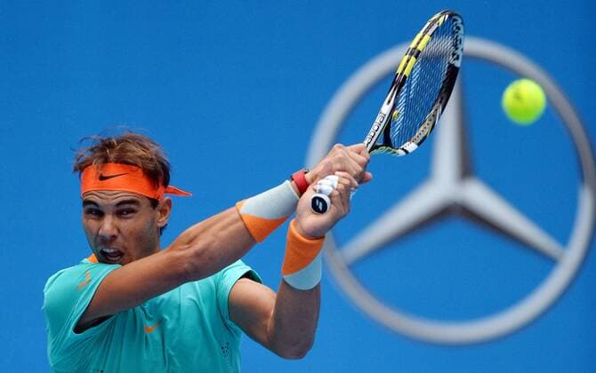 (141002) -- BEIJING, Oct. 2, 2014 -- Rafael Nadal of Spain returns a shot during the men s singles 2nd round match at the China Open tennis tournament in Beijing, China, Oct. 2, 2014. ChenxYehua 