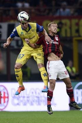 Db Milano 04 10 2014 - Serie A AC Milan vs AC Chievo Verona foto DanielexBuffa Image Sport Pictured: Keisuke Honda-Ervin Zukanovic 