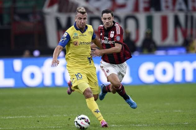 Db Milano 04 10 2014 - Serie A AC Milan vs AC Chievo Verona foto DanielexBuffa Image Sport Pictured: Gaston Maxi Lopez-Mattia De Sciglio 