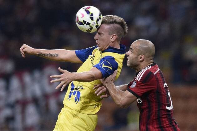 Db Milano 04 10 2014 - Serie A AC Milan vs AC Chievo Verona foto DanielexBuffa Image Sport Pictured: Gaston Maxi Lopez-Alex 