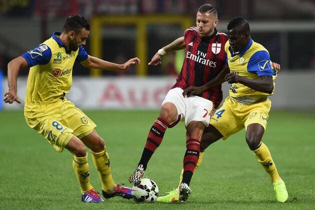 Mg Milano 04 10 2014 - Serie A AC Milan vs AC Chievo Verona foto Matteo Gribaudi Image Sport Pictured: Jeremy Menez-Ervin Zukanovic-Isaac Cofie 