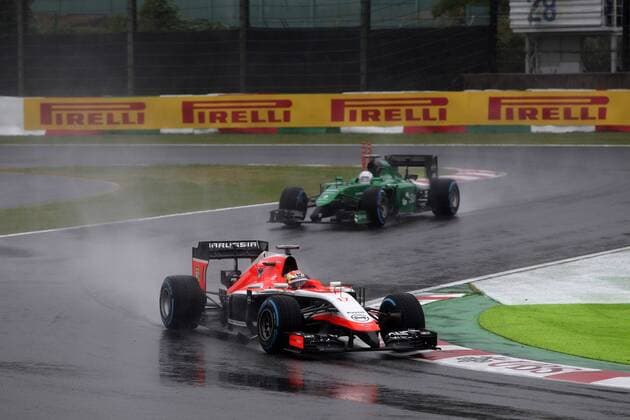 05.10.2014 - Race, Jules Bianchi (FRA) Marussia F1 Team MR03 leads Kamui Kobayashi (JAP) Caterham F1 Team CT-04 Japanese Grand Prix, Suzuka 2 - 5 October 2014 