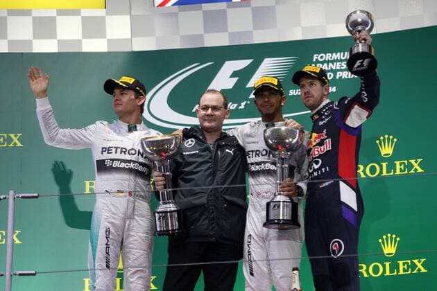 05.10.2014 - Race, 1st position Lewis Hamilton (GBR) Mercedes AMG F1 W05, 2nd position Nico Rosberg (GER) Mercedes AMG F1 W05 and 3rd position Sebastian Vettel (GER) Red Bull Racing RB10 Japanese Grand Prix, Suzuka 2 - 5 October 2014 
