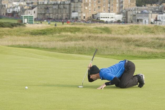 5.10.2014.St Andrews, Scotland. Alfred Dunhill Links Championship. Oliver WIlson lines a putt on the 16th xMarkxDavisonx  ActionPlus20532966