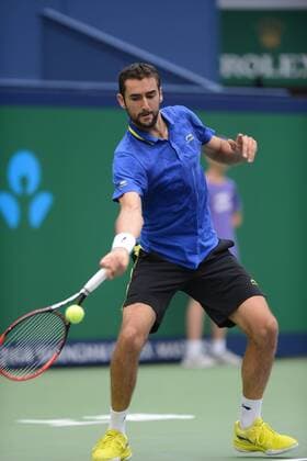 Marin Cilic of Croatia returns a shot during the men s singles first round of the 2014 Shanghai Rolex Masters tennis tournament in Shanghai, China, 6 October 2014.  20141006_64732