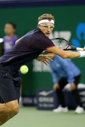 Denis Istomin of Uzbekistan prepares during the men s singles first round of the 2014 Shanghai Rolex Masters tennis tournament in Shanghai, China, 6 October 2014.  20141007_03462