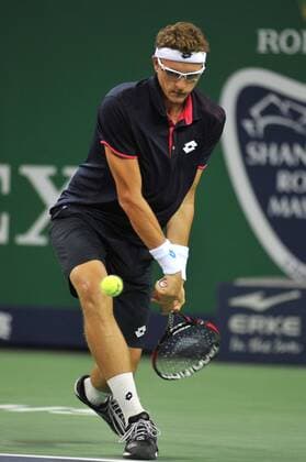 Denis Istomin of Uzbekistan returns a shot during the men s singles first round of the 2014 Shanghai Rolex Masters tennis tournament in Shanghai, China, 6 October 2014.  pbu166932_12