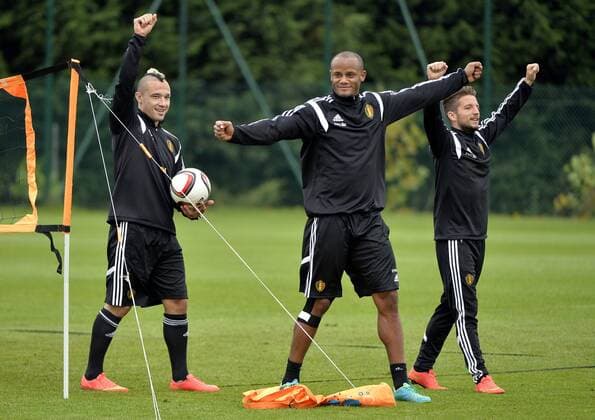 - BRUSSELS, BELGIUM: Belgium s Radja Nainggolan, Belgium s Vincent Kompany and Belgium s Dries Mertens pictured during a training session of Belgian national soccer team Red Devils, Tuesday 07 October 2014, in Brussels. Belgium will play Euro 2016 qualification games against Andorra on October 10th and against Bosnia on October 13th. ERICxLALMAND  premiumd kurio20232153