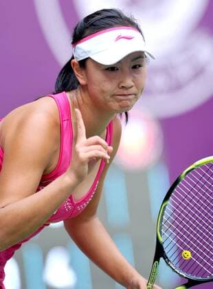Peng Shuai of China gestures during the women s singles 1st round match at the 2014 Tianjin Open tennis tournament in Tianjin, north China, on Oct. 7, 2014. Peng Shuai won 2-1. ) (SP)CHINA-TIANJIN-TENNIS-WTA-OPEN YuexYuewei 
