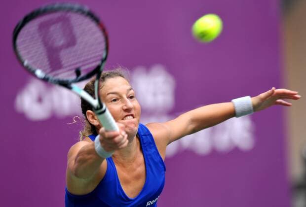 Shahar Peer of Israel returns a hit during the women s singles 1st round match at the 2014 Tianjin Open tennis tournament in Tianjin, north China, on Oct. 7, 2014. (SP)CHINA-TIANJIN-TENNIS-WTA-OPEN YuexYuewei 