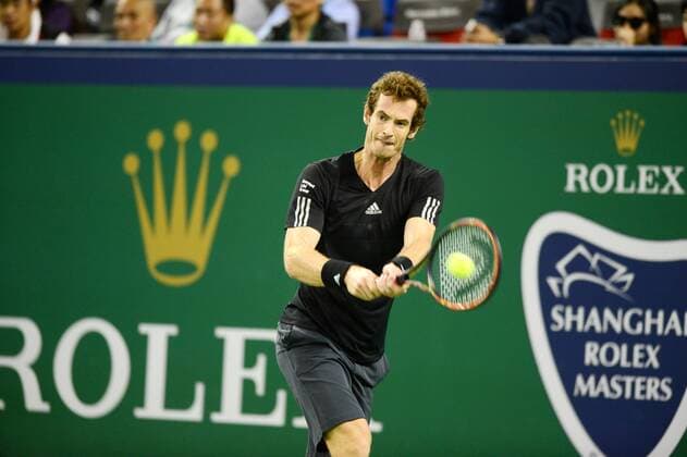Andy Murray of Britain returns a shot in the first round of the men s singles during the 2014 Shanghai Rolex Masters tennis tournament in Shanghai, China, 7 October 2014.  20141007_10317