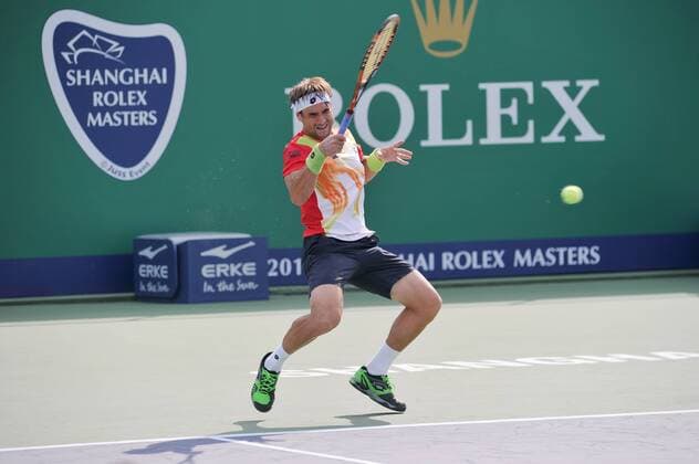 David Ferrer of Spain returns a shot in the second round of the men s singles during the 2014 Shanghai Rolex Masters tennis tournament in Shanghai, China, 8 October 2014  20141008_08311