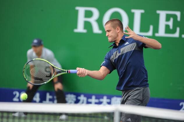 Mikhail Youzhny of Russia returns a shot in the second round of the men s singles during the 2014 Shanghai Rolex Masters tennis tournament in Shanghai, China, 8 October 2014  20141008_62175
