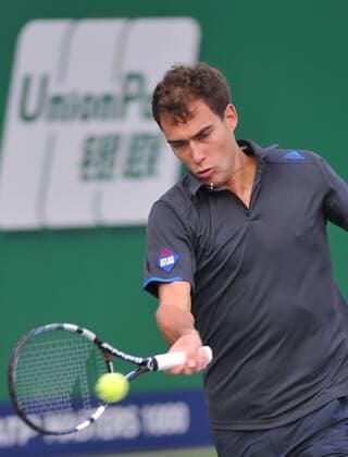 Jerzy Janowicz of Poland returns a shot in the second round of the men s singles during the 2014 Shanghai Rolex Masters tennis tournament in Shanghai, China, 8 October 2014  20141008_08811