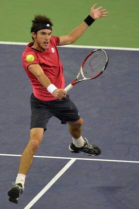 Florian Mayer of Germany returns a shot in the second round of the men s singles during the 2014 Shanghai Rolex Masters tennis tournament in Shanghai, China, 8 October 2014  20141008_46788