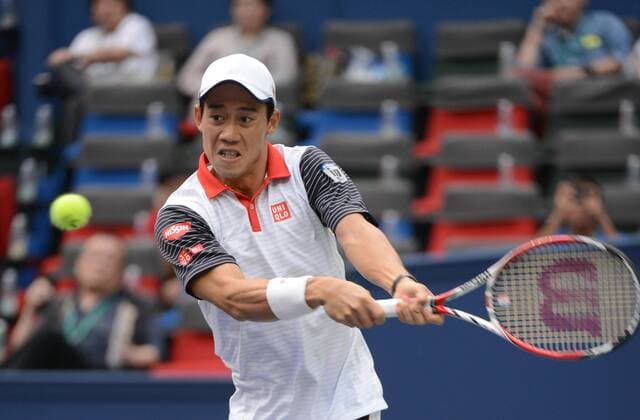 Kei Nishikori of Japan prepares in the second round of the men s singles during the 2014 Shanghai Rolex Masters tennis tournament in Shanghai, China, 8 October 2014.  20141008_63244