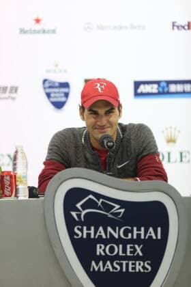 Roger Federer of Switzerland smiles at a press conference in the second round of the men s singles during the 2014 Shanghai Rolex Masters tennis tournament in Shanghai, China, 9 October 2014  20141009_00592