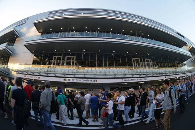 SOCHI, RUSSIA. OCTOBER 9, 2014. gather outside the Sochi Autodrom Formula One circuit ahead of the 2014 Russian F1 Grand Prix in Sochi. Stanislav Krasilnikov TASS  RE151698