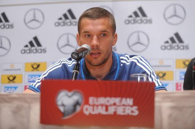 German football team at a press conference before EURO Qualifires on October 10, 2014 in Warsaw. In the picture: Lukas Podolski  EN_01149054_0023