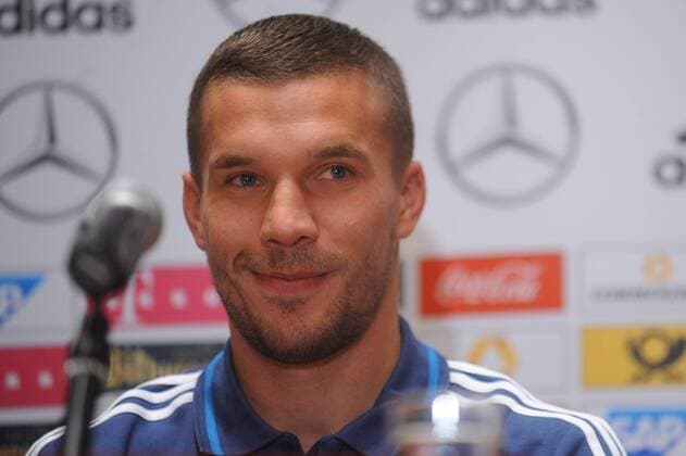 German football team at a press conference before EURO Qualifires on October 10, 2014 in Warsaw. In the picture: Lukas Podolski  EN_01149054_0028