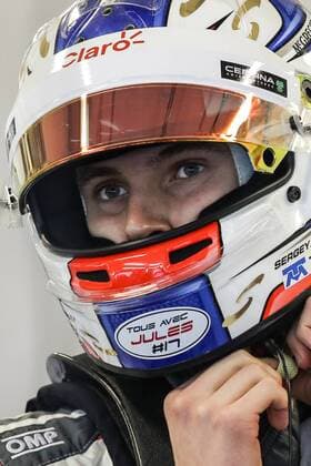 SOCHI, RUSSIA. OCTOBER 10, 2014. Russian racing driver Sergei Sirotkin of the Sauber F1 Team looks on ahead of the first free practice session of the 2014 Formula One Russian Grand Prix at the Sochi Autodrom racing circuit. StanislavKrasilnikov TASS  RE1517A3