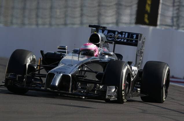 SOCHI, RUSSIA. OCTOBER 10, 2014. British racing driver Jenson Button of the McLaren Mercedes F1 participates in the first free practice session of the 2014 Formula One Russian Grand Prix at the Sochi Autodrom racing circuit. Sergei Savostyanov TASS  RE151825