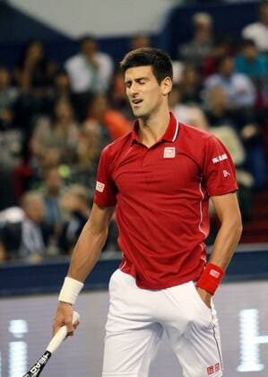 (141011) -- SHANGHAI, Oct. 11, 2014 -- Novak Djokovic of Serbia reacts during the men s singles semifinal match at the Shanghai Masters tennis tournament in Shanghai, east China, Oct. 11, 2014. (SP)CHINA-SHANGHAI-TENNIS-ATP-SHANGHAI MASTERS (CN) DingxTing 