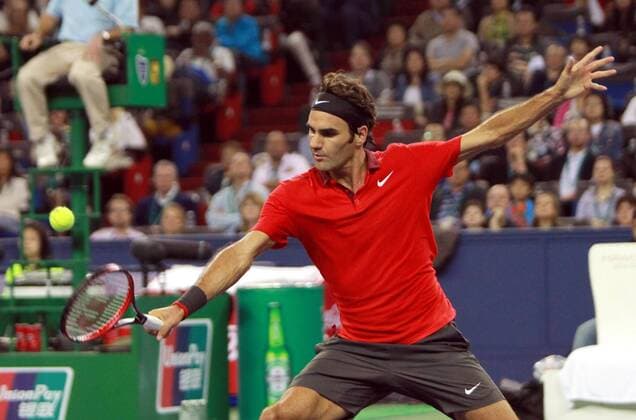 (141011) -- SHANGHAI, Oct. 11, 2014 -- Roger Federer of Switzerland returns the ball during the men s singles semifinal match at the Shanghai Masters tennis tournament in Shanghai, east China, Oct. 11, 2014. (SP)CHINA-SHANGHAI-TENNIS-ATP-SHANGHAI MASTERS (CN) RenxLong 