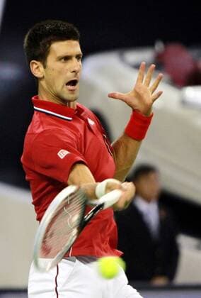 (141011) -- SHANGHAI, Oct. 11, 2014 -- Novak Djokovic of Serbia returns the ball during the men s singles semifinal match at the Shanghai Masters tennis tournament in Shanghai, east China, Oct. 11, 2014. (SP)CHINA-SHANGHAI-TENNIS-ATP-SHANGHAI MASTERS (CN) DingxTing 