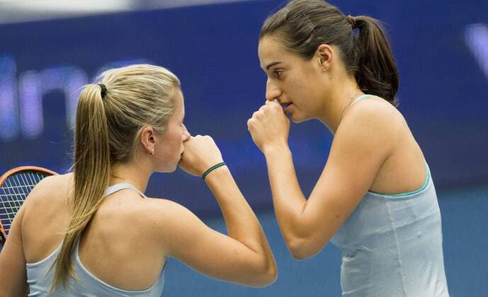 TENNIS - WTA, Generali Ladies Linz LINZ,AUSTRIA,11.OCT.14 - TENNIS - WTA Tennis Damen Tour, Generali Ladies Linz, doubles. Image shows Annika Beck (GER) and Caroline Garcia (FRA). 