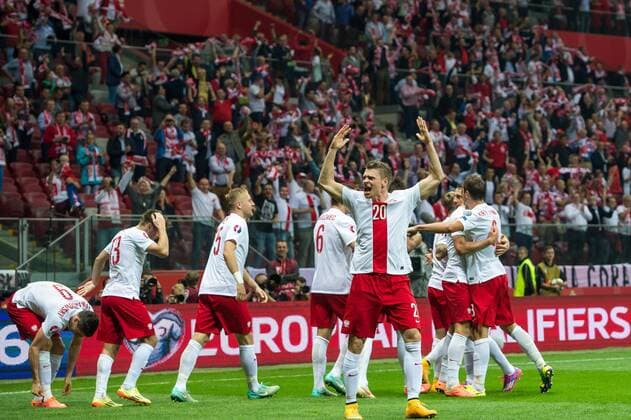 WARSAW 1 Qualifying match for the 2016 UEFA European Championship group D Poland vs Germany On the picture: Poland joy after goal celebrates after scoring goal Arkadiusz Milik poland 7 Lukasz Piszczek poland 20 P  141011_2SB4138
