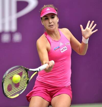 Belinda Bencic of Switzerland returns a shot during the women s singles final at the 2014 Tianjin Open tennis tournament in Tianjin, north China, on Oct. 12, 2014. (SP)CHINA-TIANJIN-TENNIS-WTA-OPEN YuexYuewei 