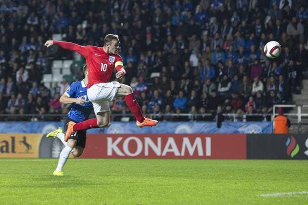 Wayne Rooney of Manchester United sends a volley just wide - Estonia vs. England - UEFA Euro 2016 Qualifier - A. Le Coq Arena - Tallinn - 12 10 2014 Pic Philip Oldham Sportimage EDITORIAL USE ONLY. No use with unauthorised audio, video, data, fixture lists, club league logos or live services. Online in-match use limited to 120 images, no video emulation. No use in betting, games or single club league player publications.
