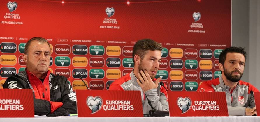 Turkey National Football Team head coach Fatih Terim and Player Gokhan Gonul during the press conference at Skonto Sadium in Riga on 12 October 2014 Pictured: Coach Fatih Terim and Gokhan Gonul (R) 