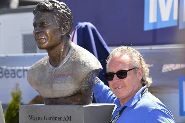 17.10.2014. Phillip Island, Victoria, Australia. MotoGP Motorcycle World Championships,Practice Day. Former champion Wayne Gardner next to his unvieled statue xNigelxOwenx  ActionPlus11568593
