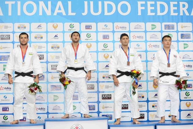 Gold medallist Roman Mustopoulos of Greece (2nd L), silver medallist Yakhyo Imamov of Uzbekistan (1st L) attend the award ceremony for Men s -81KG match at Tashkent 2014 Judo Grand Prix in Tashkent, Uzbekistan, on Oct. 17, 2014. ) (SP)UZBEKISTAN-TASHKENT-JUDO GRAND PRIX Sadat 