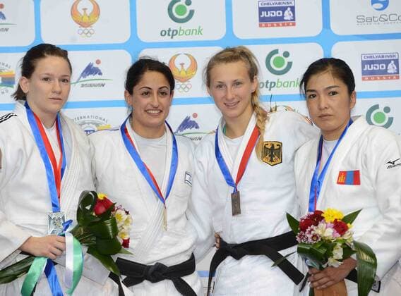 Gold medalist Yarden Gerbi of Israel(2nd,L), silver medalist Kathrin Unterwurzacher of Austria(1st, L), bronze medalist Martyna Trajdos (GER) and Isabel PUCHE (ESP) pose for photos during the award ceremony for Women s -63KG match at Tashkent 2014 Judo Grand Prix in Tashkent, Uzbekistan, on Oct. 17, 2014. ) (SP) TASHKENT-JUDO GRAND PRIX Sadat 
