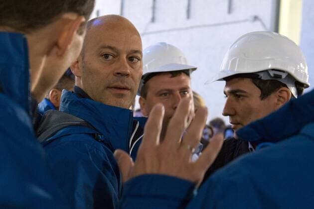 MOSCOW, RUSSIA. OCTOBER 18, 2014. FIFA inspection committee head Christian Unger (L) and FIFA and Russia 2018 officials in discussion at Fisht stadium which will become an arena for the coming 2018 FIFA World Cup. Artur Lebedev TASS  premiumd 20142188