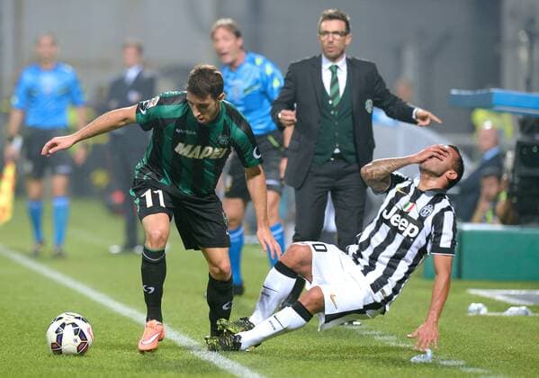 IPP20141018 Football - soccer: Serie A, Sassuolo Calcio - Juventus Turin, Carlos Tevez, Sime Vrsaljko xHOCHxZWEIx xItalyxPhotoxPressx 
