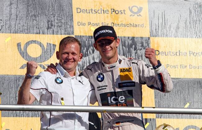 19.10.2014 - RMG-Teamchef Stefan Reinhold (BMW) freut sich mit Meister Marco Wittmann (GER) (BMW Team RMG - BMW M4 DTM) über den Titelgewinn beim DTM-Lauf auf dem Hockenheimring. Copyright MP-Sport Pakusch
