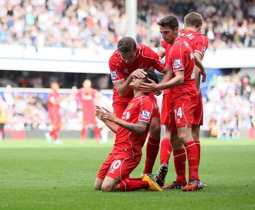 Liverpool s Philippe Coutinho celebrates scoring his sides second goal - Barclays Premier League - QPR vs Liverpool - Loftus Road - England - 19th October 2014 - Picture David Klein Sportimage EDITORIAL USE ONLY. No use with unauthorised audio, video, data, fixture lists, club league logos or live services. Online in-match use limited to 120 images, no video emulation. No use in betting, games or single club league player publications.