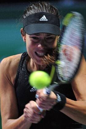 Serbia s Ana Ivanovic serves during the round robin match of the WTA Tennis Damen Finals of the United States at the Singapore Indoor Stadium, Oct. 20, 2014. ThenxChihxWey 