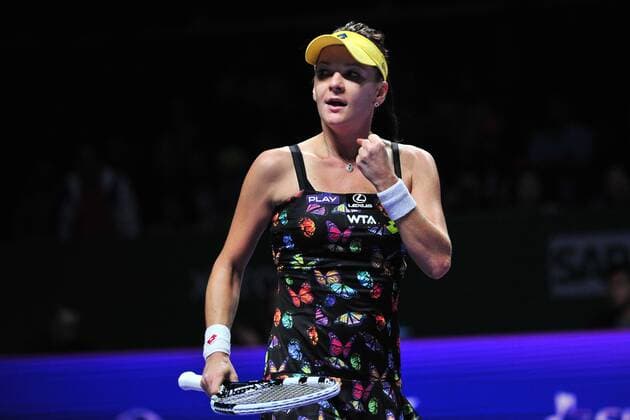 SINGAPORE, Oct. 21, 2014 -- Poland s Agnieszka Radwanska celebrates during the WTA Tennis Damen Finals singles tennis match at the Singapore Indoor Stadium, Oct. 21, 2014. ThenxChihxWey 