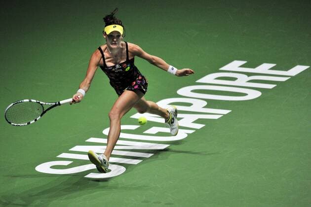 SINGAPORE, Oct. 21, 2014 -- Poland s Agnieszka Radwanska returns the ball during the WTA Tennis Damen Finals singles tennis match at the Singapore Indoor Stadium, Oct. 21, 2014. ThenxChihxWey 