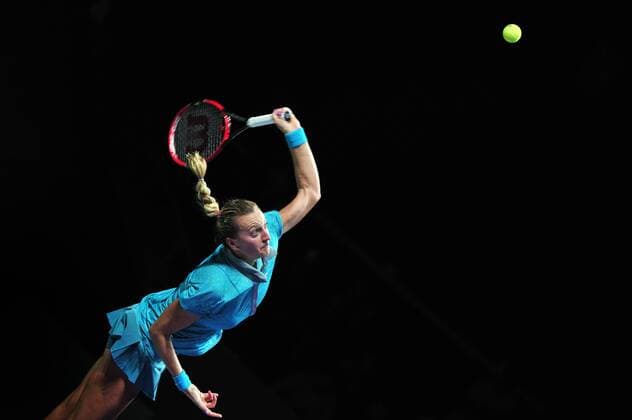 SINGAPORE, Oct. 21, 2014 -- The Czech Republic s Petra Kvitova returns the ball during the WTA Tennis Damen Finals singles tennis match at the Singapore Indoor Stadium, Oct. 21, 2014. ThenxChihxWey 