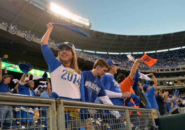 Kansas City fans cheer before the start of game 1 of the World Series between the San Francisco Giants and the Kansas City Royals at Kaufman Stadium in Kansas City, Missouri on October 21, 2014.  KCP2014102101
