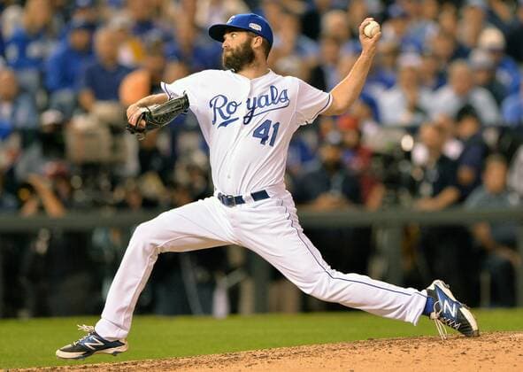 Kansas City Royals reliever Danny Duffy throws against the San Francisco Giants during the fourth inning of game 1 of the World Series at Kaufman Stadium in Kansas City, Missouri on October 21, 2014.  KCP2014102144